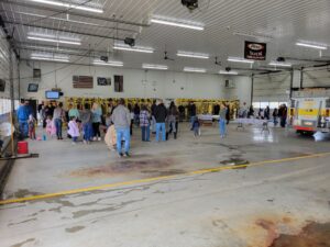 Participants lining up and getting instructionsws for the easter egg evens
